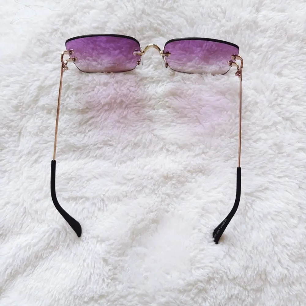 Laurel Clear Purple Rimless Sleek Sunglasses